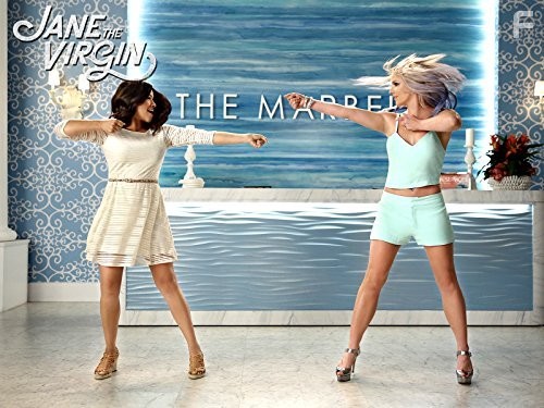 Britney Spears and Gina Rodriguez in Девственница Джейн (2014)