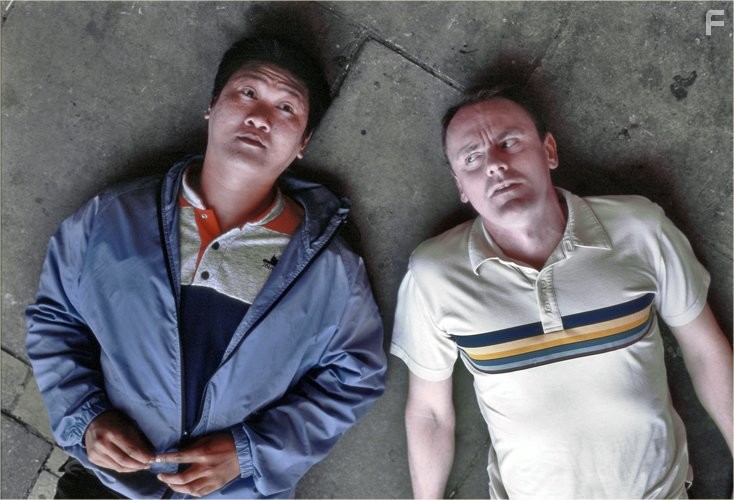 Sean Lock and Benedict Wong in 15 Storeys High (2002)