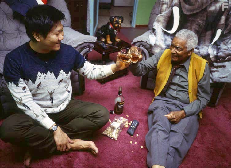 Earl Cameron and Benedict Wong in 15 Storeys High (2002)