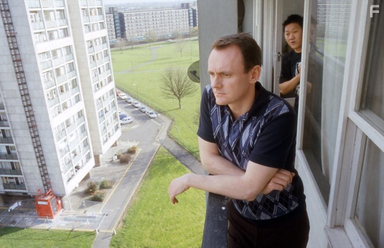 Sean Lock and Benedict Wong in 15 Storeys High (2002)
