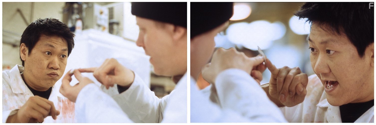 Martin Trenaman and Benedict Wong in 15 Storeys High (2002)