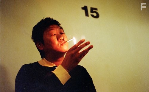 Benedict Wong in 15 Storeys High (2002)