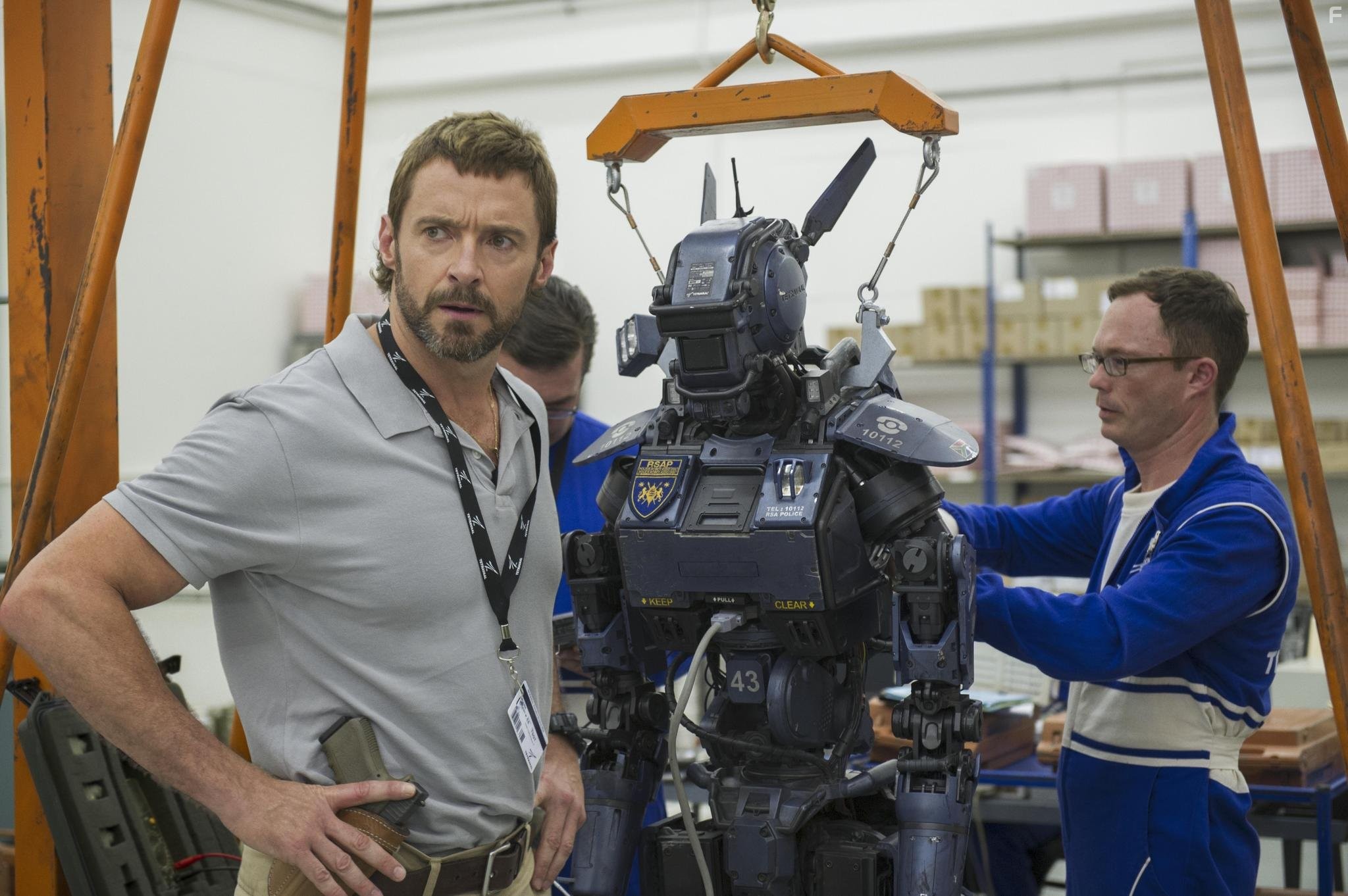 Paul Dobson, Hugh Jackman, and Jason Cope in Робот по имени Чаппи (2015)