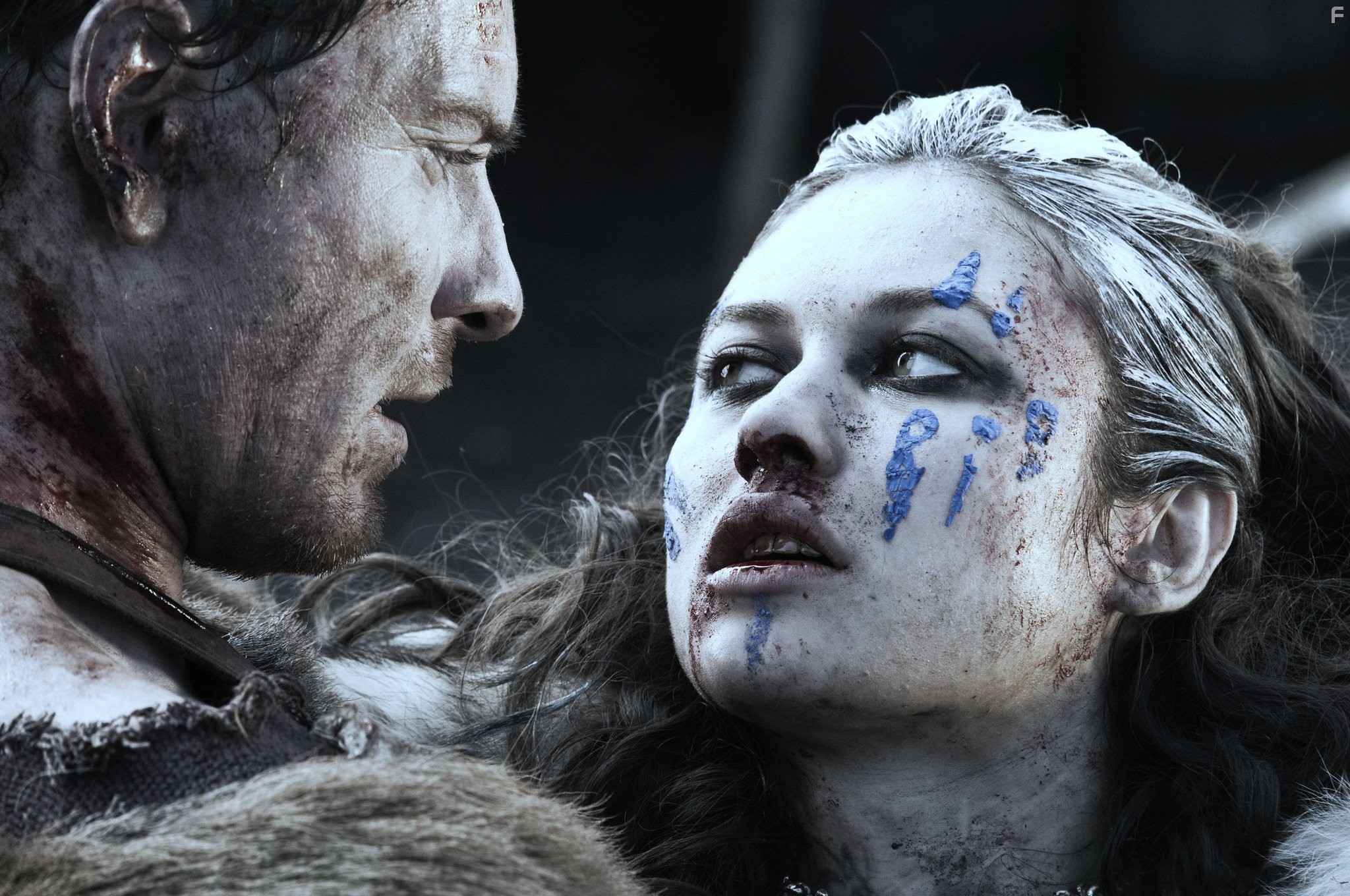 Michael Fassbender and Olga Kurylenko in Центурион (2010)