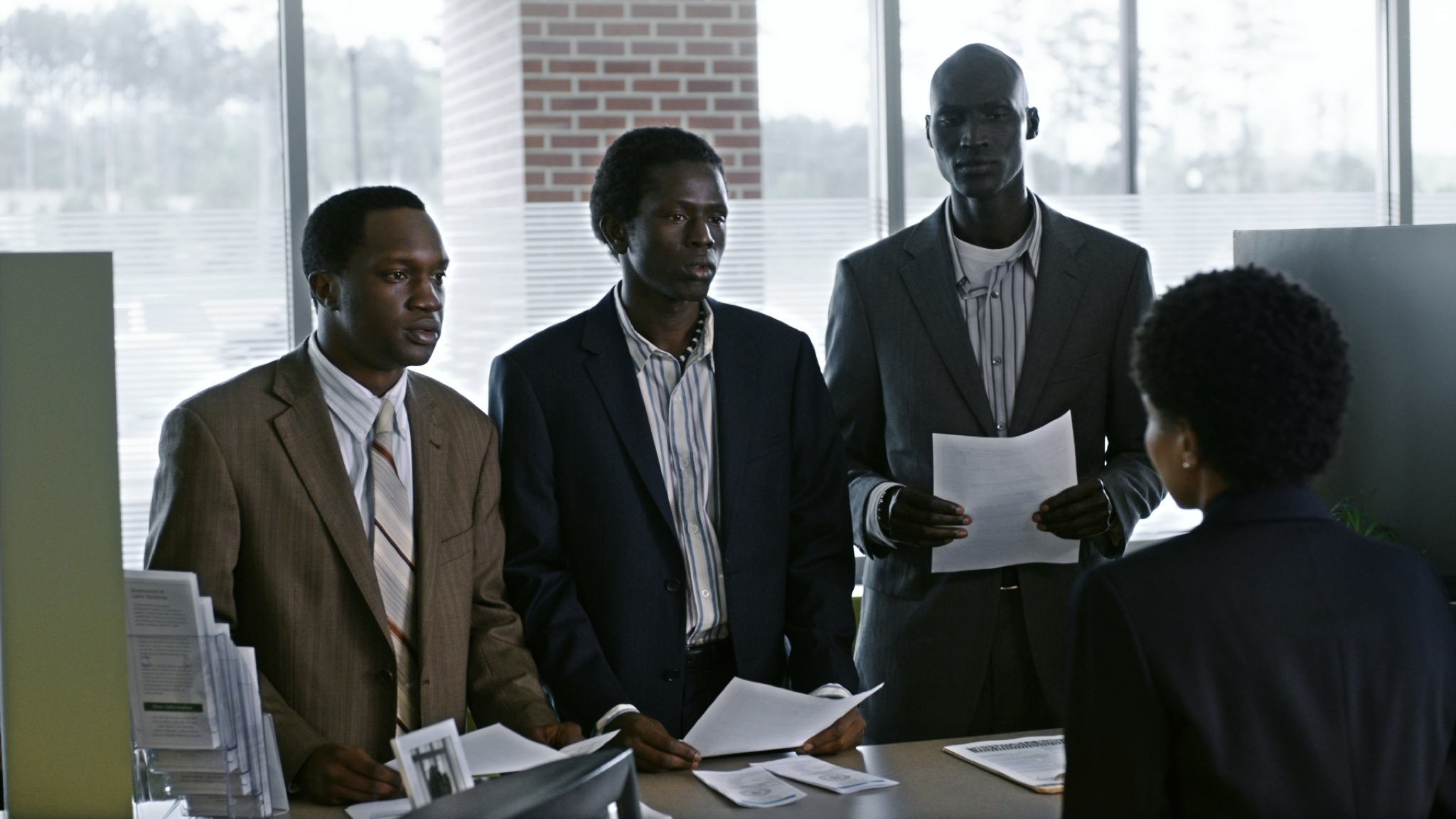 Arnold Oceng, Ger Duany, and Emmanuel Jal in Приятная ложь (2014)
