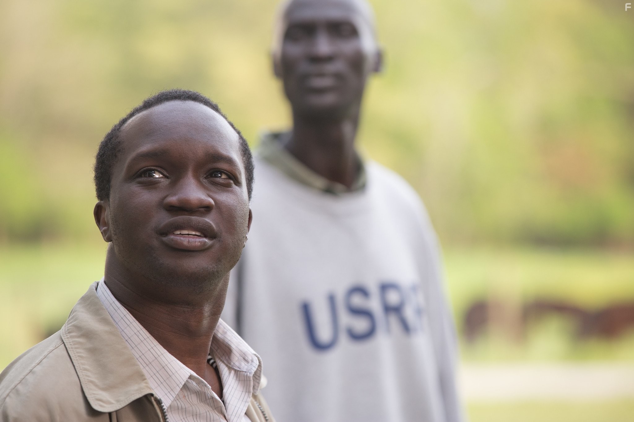 Arnold Oceng and Ger Duany in Приятная ложь (2014)