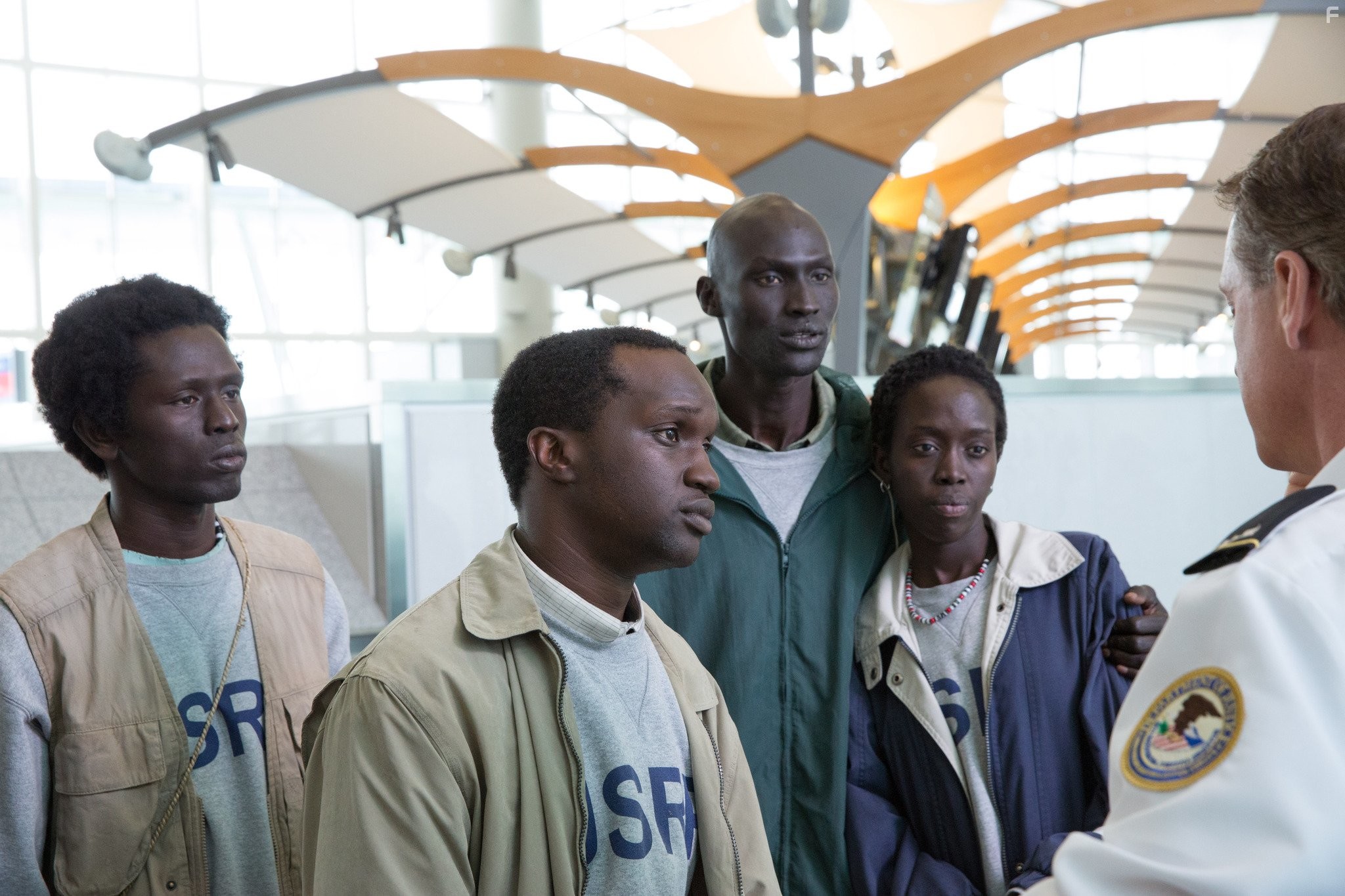 Arnold Oceng, Ger Duany, Emmanuel Jal, and Kuoth Wiel in Приятная ложь (2014)