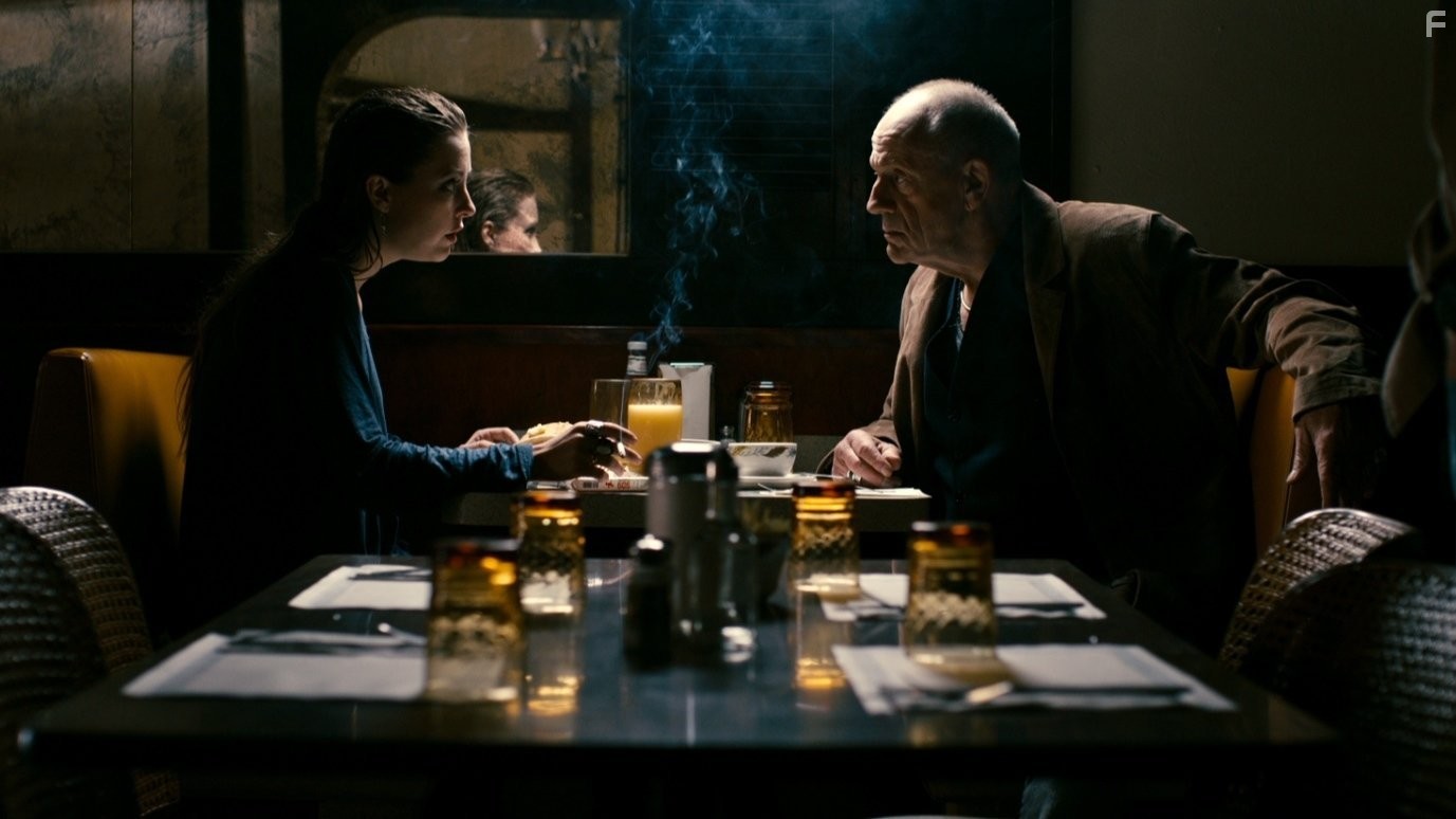 Still of Katharine Isabelle and Christopher Lloyd in 88.