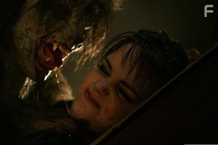 Sam (Kimberly J. Brown) has a close encounter with the Beast (Richard Tyson).