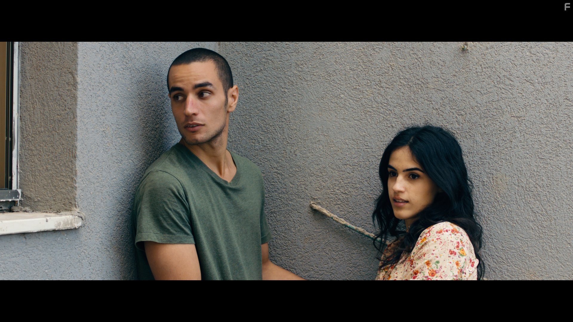 Adam Bakri and Leem Lubany in Омар (2013)