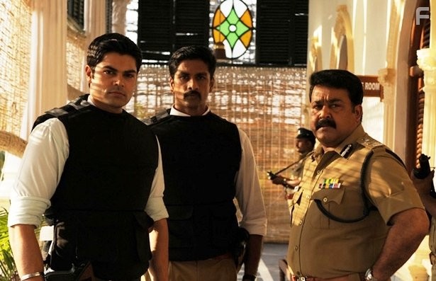 Mohanlal, Ganesh Venkatraman, and Bharath Reddy in Тот день (2009)