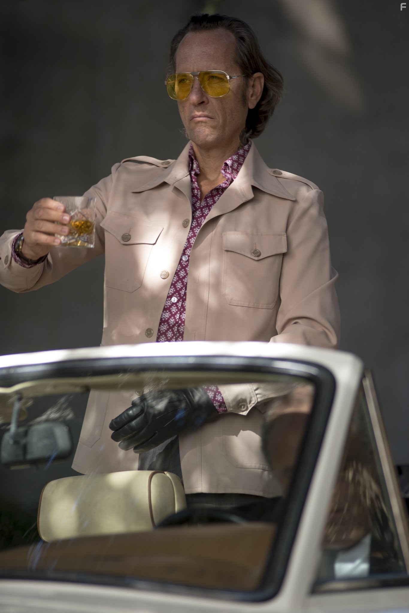 Richard E. Grant as “Dickie” in DOM HEMINGWAY.