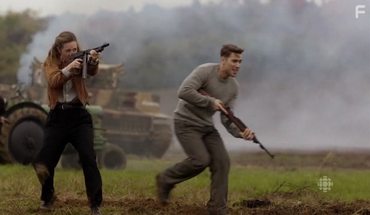 Dustin Milligan and Evelyne Brochu in Лагерь Х (2015)