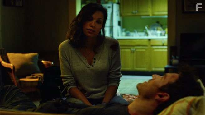 Rosario Dawson and Charlie Cox in Сорвиголова (2015)