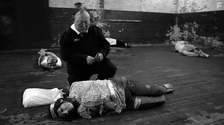 Katherine Templar and Laurence R. Harvey in Чeловеческая многоножка 2 (2011)