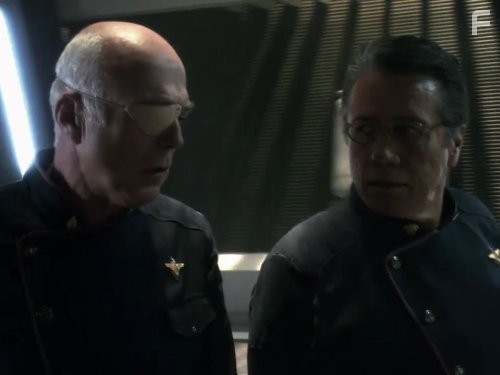 Edward James Olmos and Michael Hogan in Звездный крейсер Галактика (2004)
