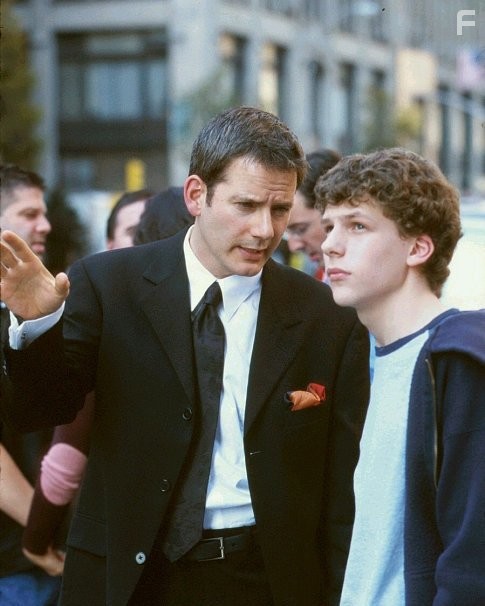 Roger (Campbell Scott) guides Nick (Jesse Eisenberg) through the city's nightlife for an all-night crash course on how to manipulate women.