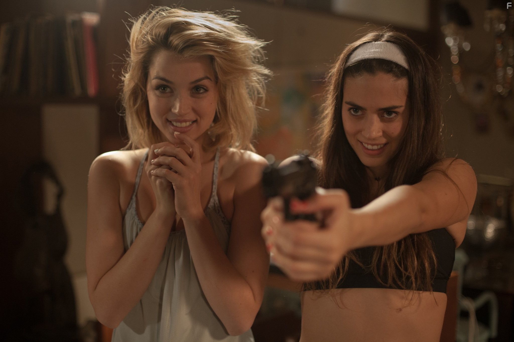 Ana de Armas and Lorenza Izzo in Кто там (2015)