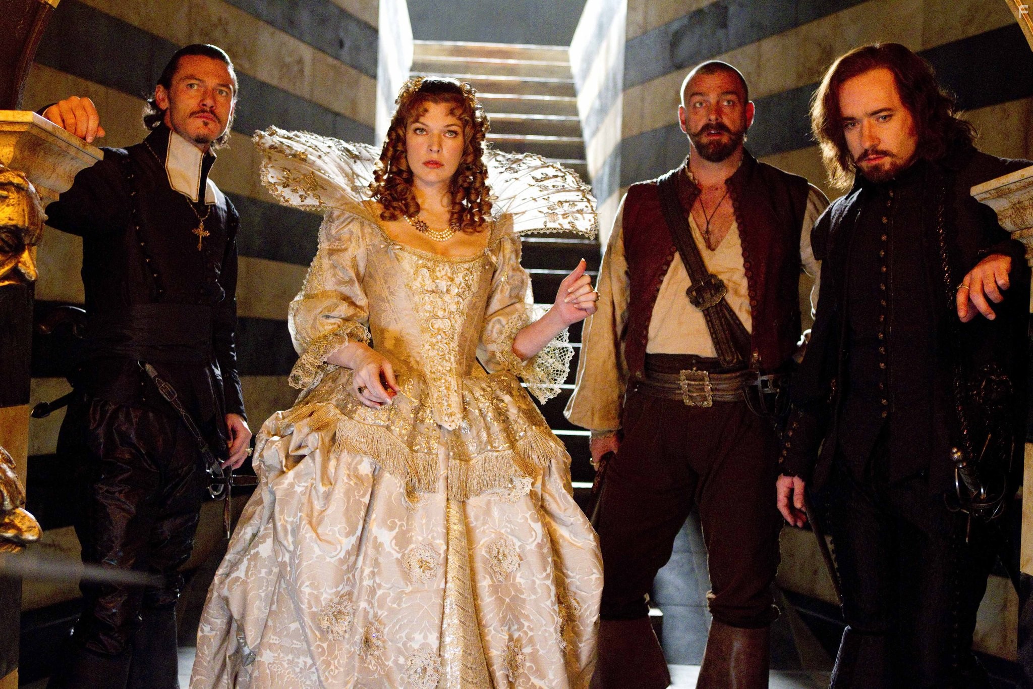 Milla Jovovich, Matthew Macfadyen, Ray Stevenson, and Luke Evans in Мушкетёры (2011)