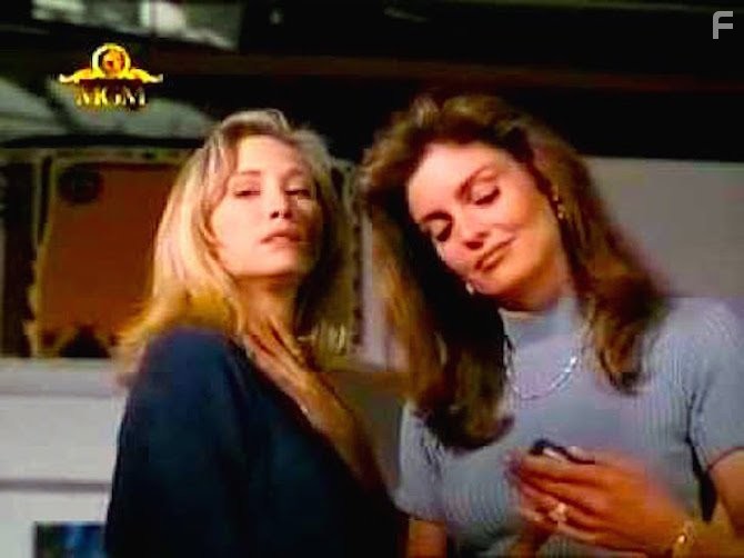 Tracy Scoggins and Shari Shattuck in Dead On (1994)